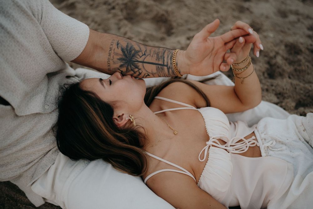 Fun at the beach celebrating love and an engagement.