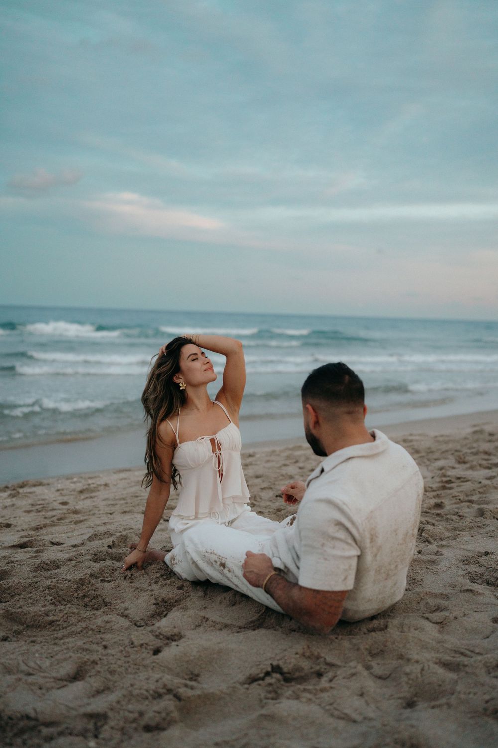 Fun at the beach celebrating love and an engagement.