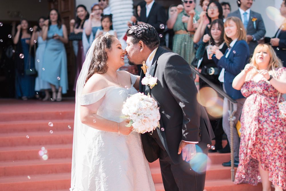Husband and wife kiss after marrying