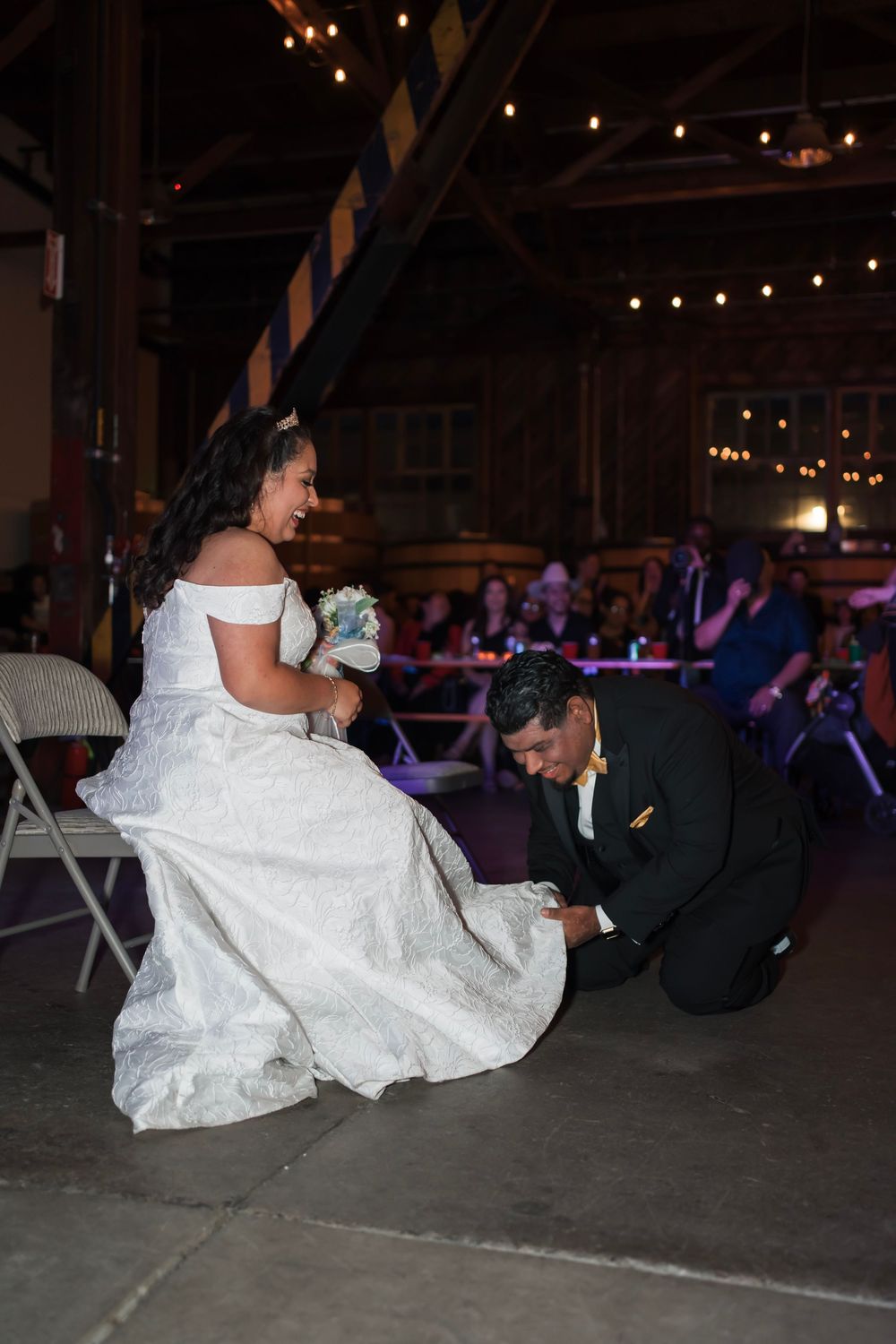The husband practices traditional games during their first dance