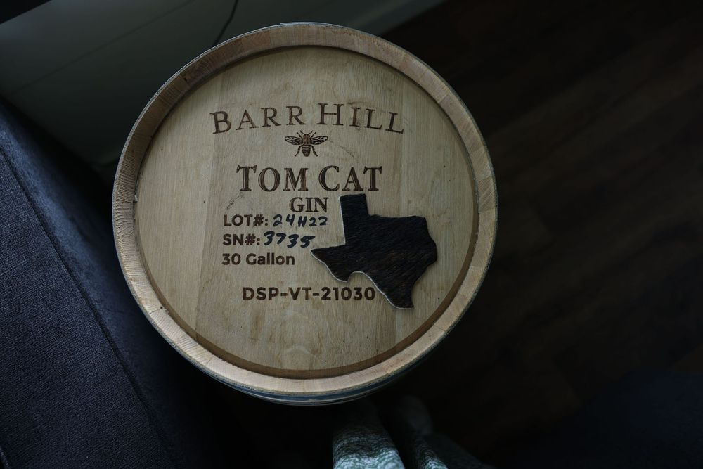 Barr Hill Tom Cat Gin 30-gallon oak aging barrel with Texas state outline and DSP-VT-21030 label.