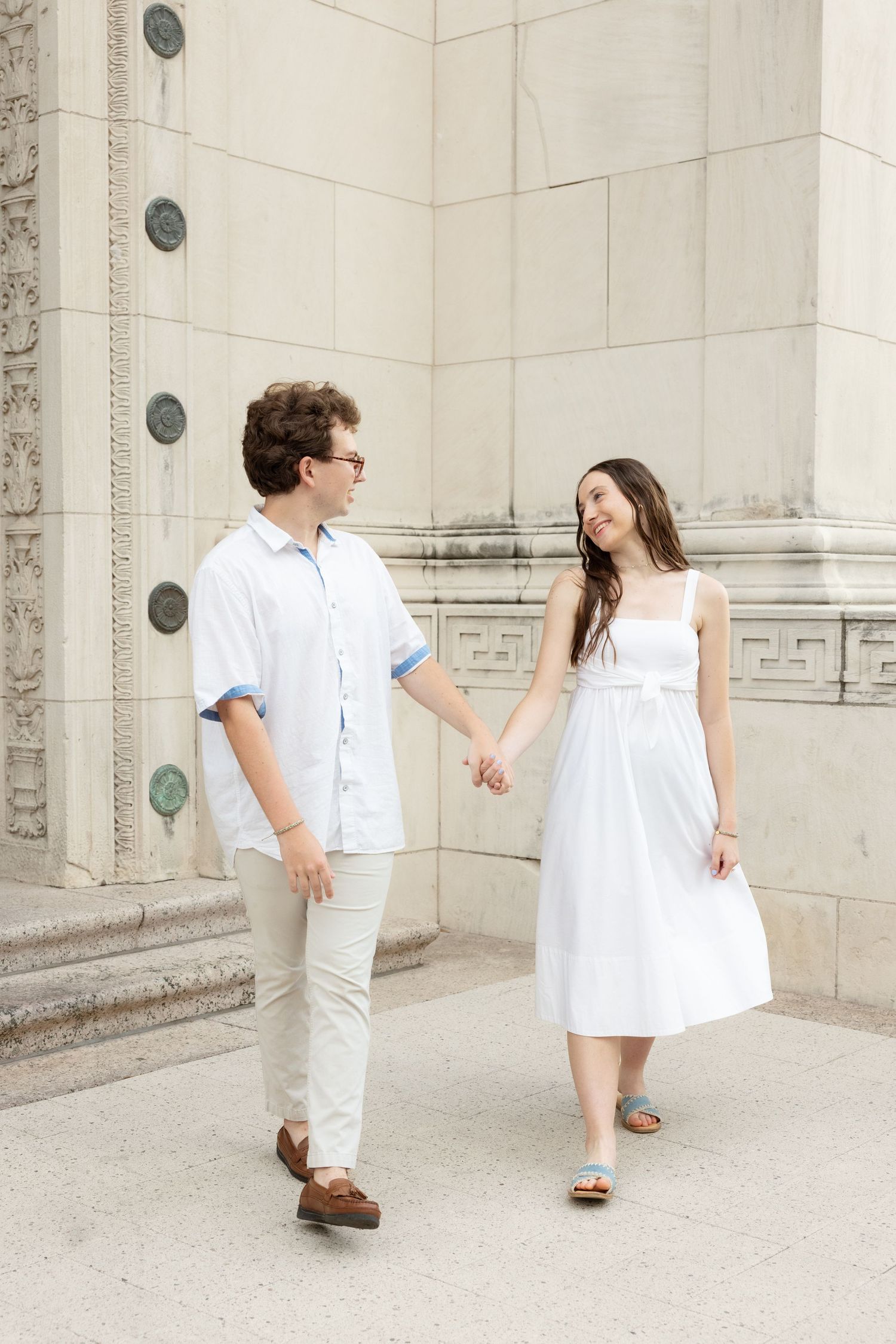 engagement photographer taking engagement photos in downtown Fort Worth Texas