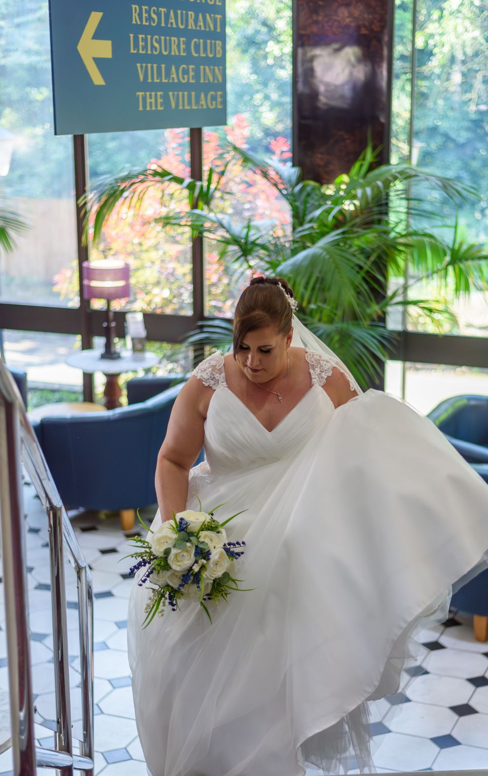 Bride walking upstairs
