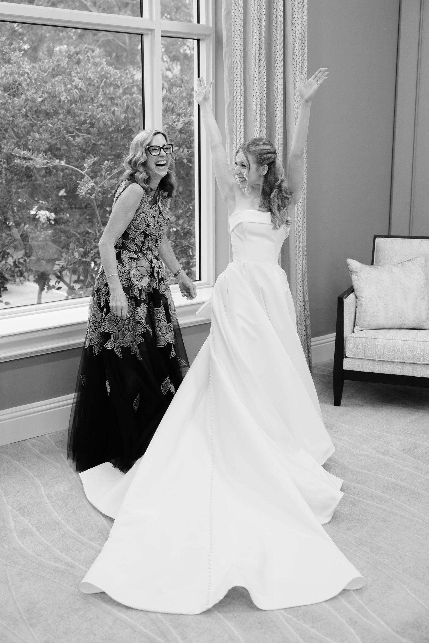 Excited mother and bride at BallenIsles Country Club in Palm Beach during a wedding photographed by Ohio photographer Tom Forrest.