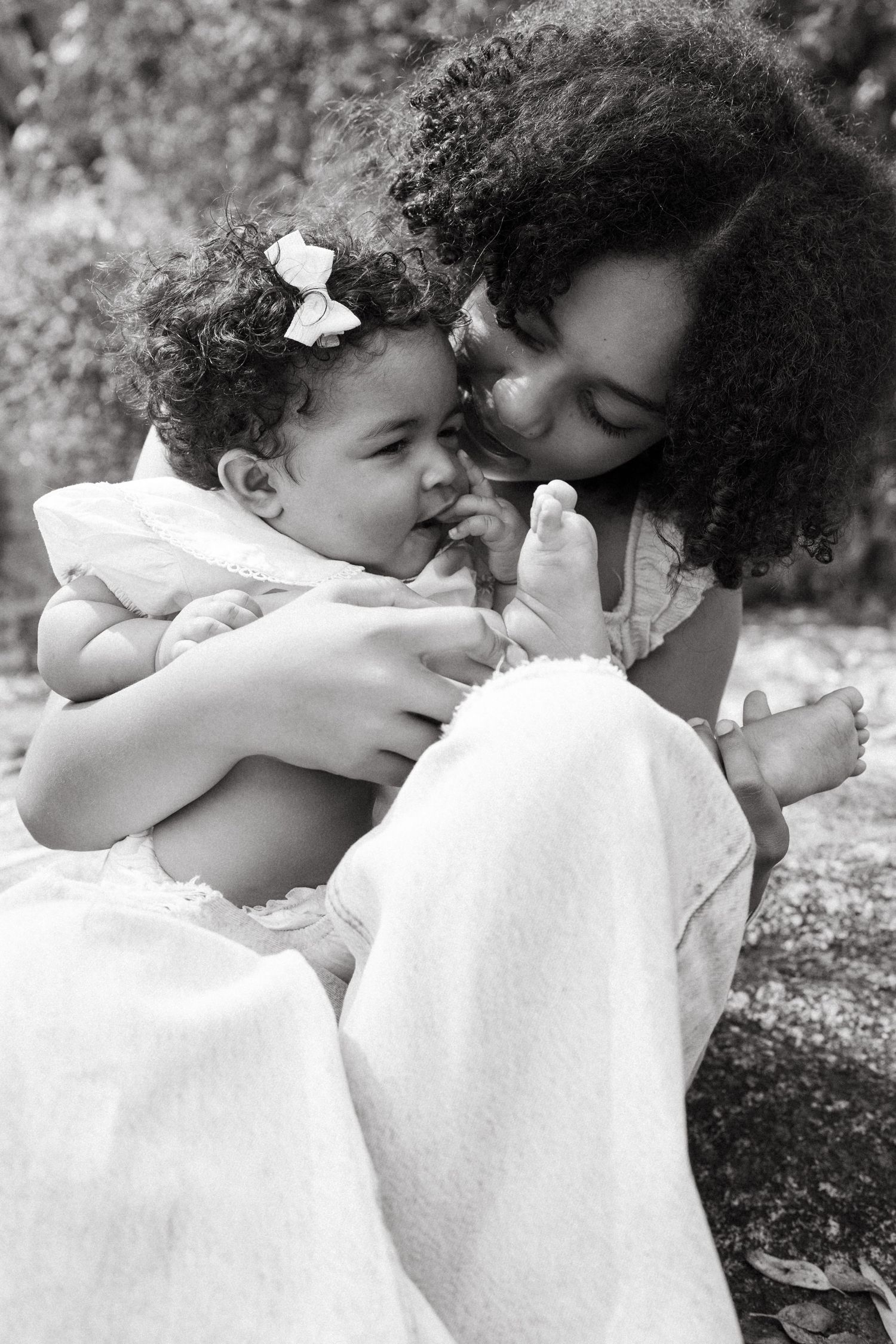 Black and white series showing tender embraces and emotional connection.