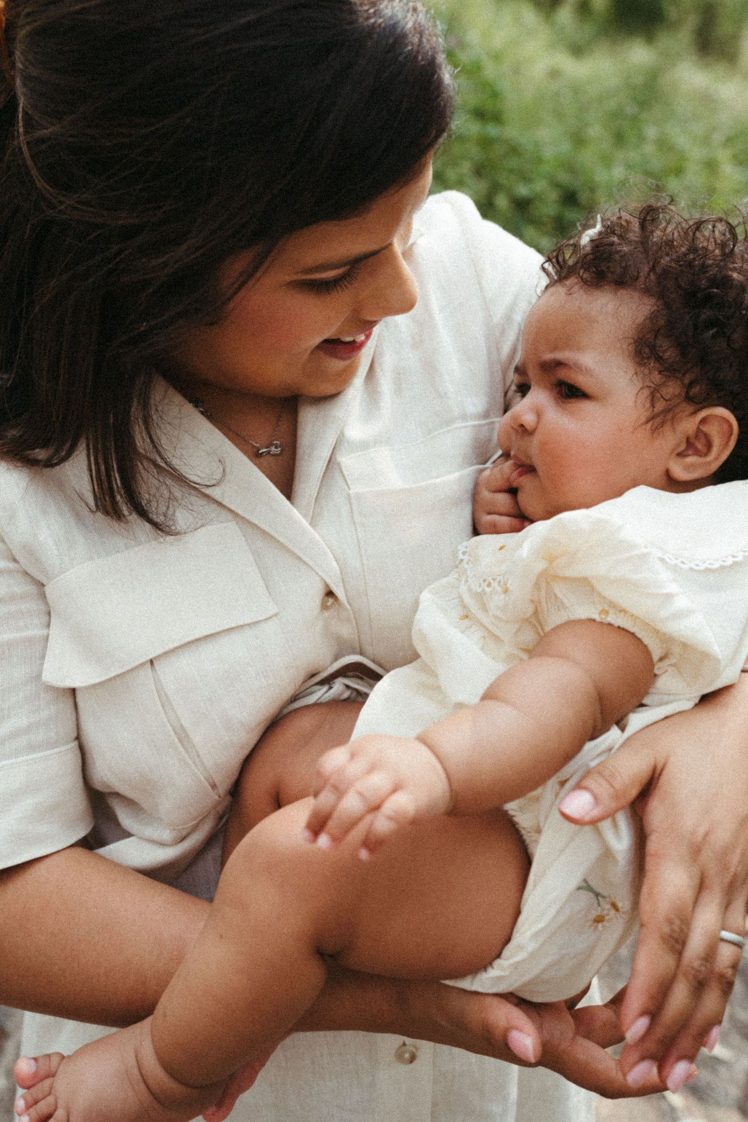 Candid moments of gentle interaction captured in warm natural light.