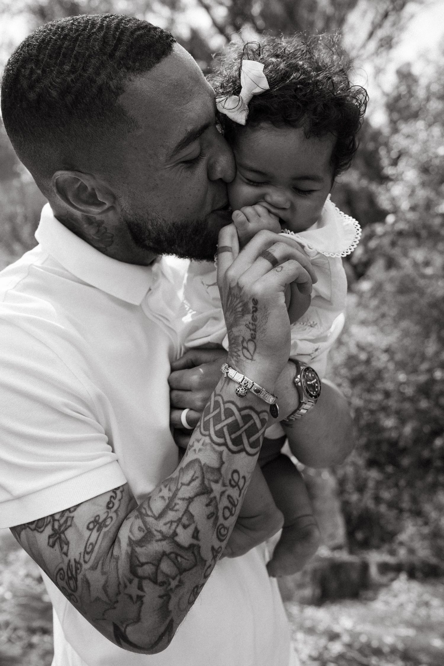 A series of outdoor photos showing sweet moments between parent and child.