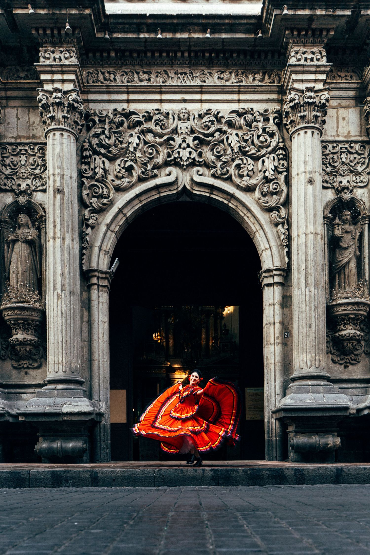 Professional dance photography of Ballet Folklórico on historic streets of Mexico City