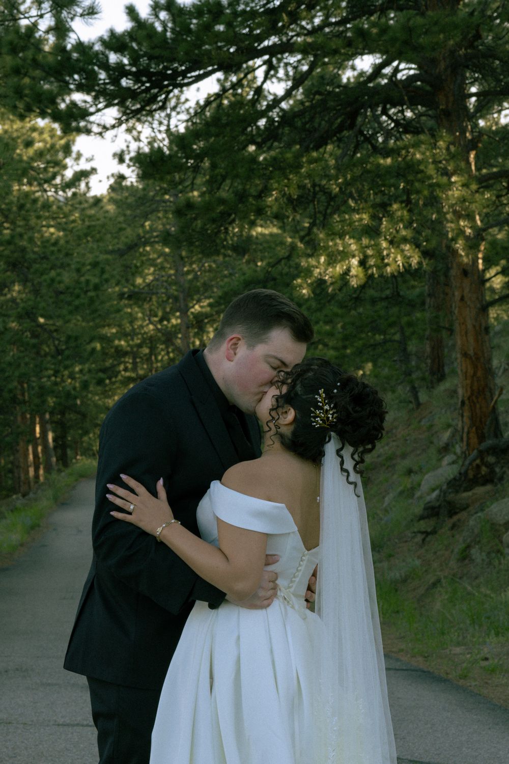 Micro wedding couple sharing a quiet moment during portraits in Boulder, Colorado.