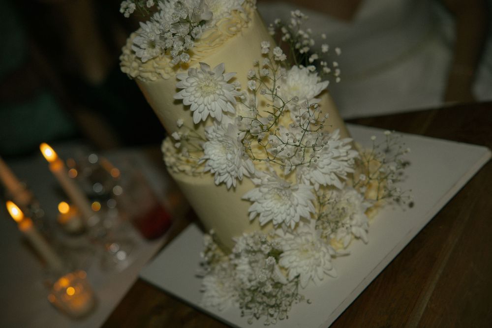 Small wedding cake displayed during a Boulder micro wedding celebration.
