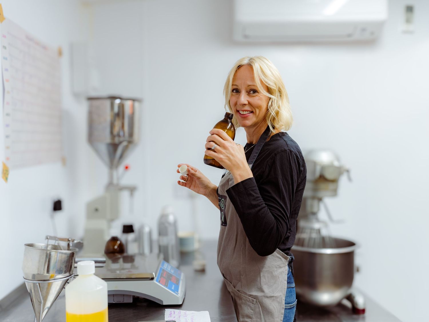 Natural skincare brand photography for Fox and Bloom, founder Donna Edwards in her production lab, Kent