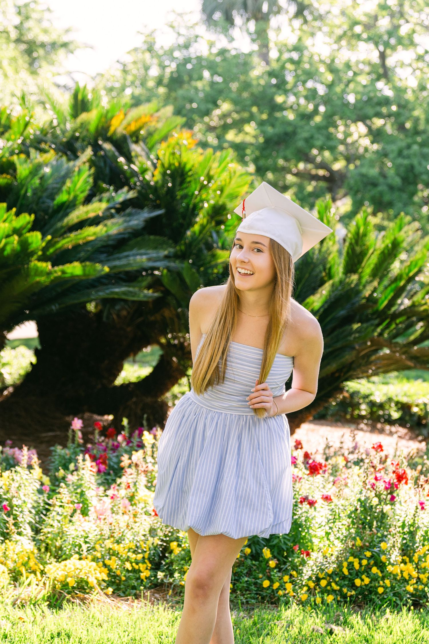 Sea Island senior pictures showcasing Gabi surrounded by blooming spring scenery