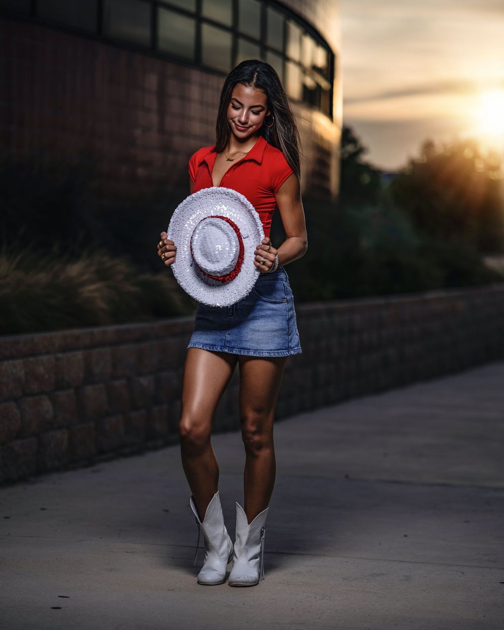 A sequence of photos showing white cowboy boots and denim against a sunset backdrop at dusk.