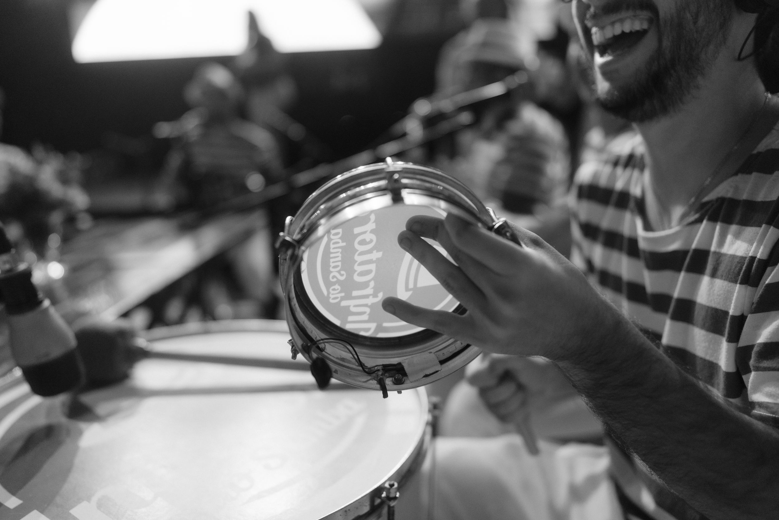 Black and white photo of musicians performing at an event.