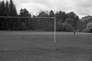 solitary man on football pitch alston