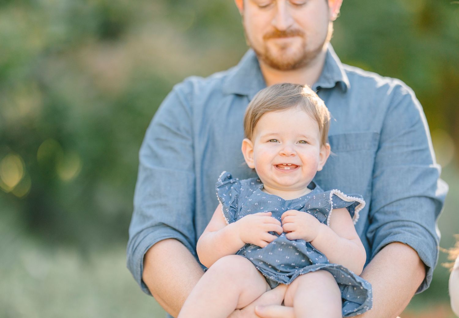 Candid family moments captured during a golden hour photography session.
