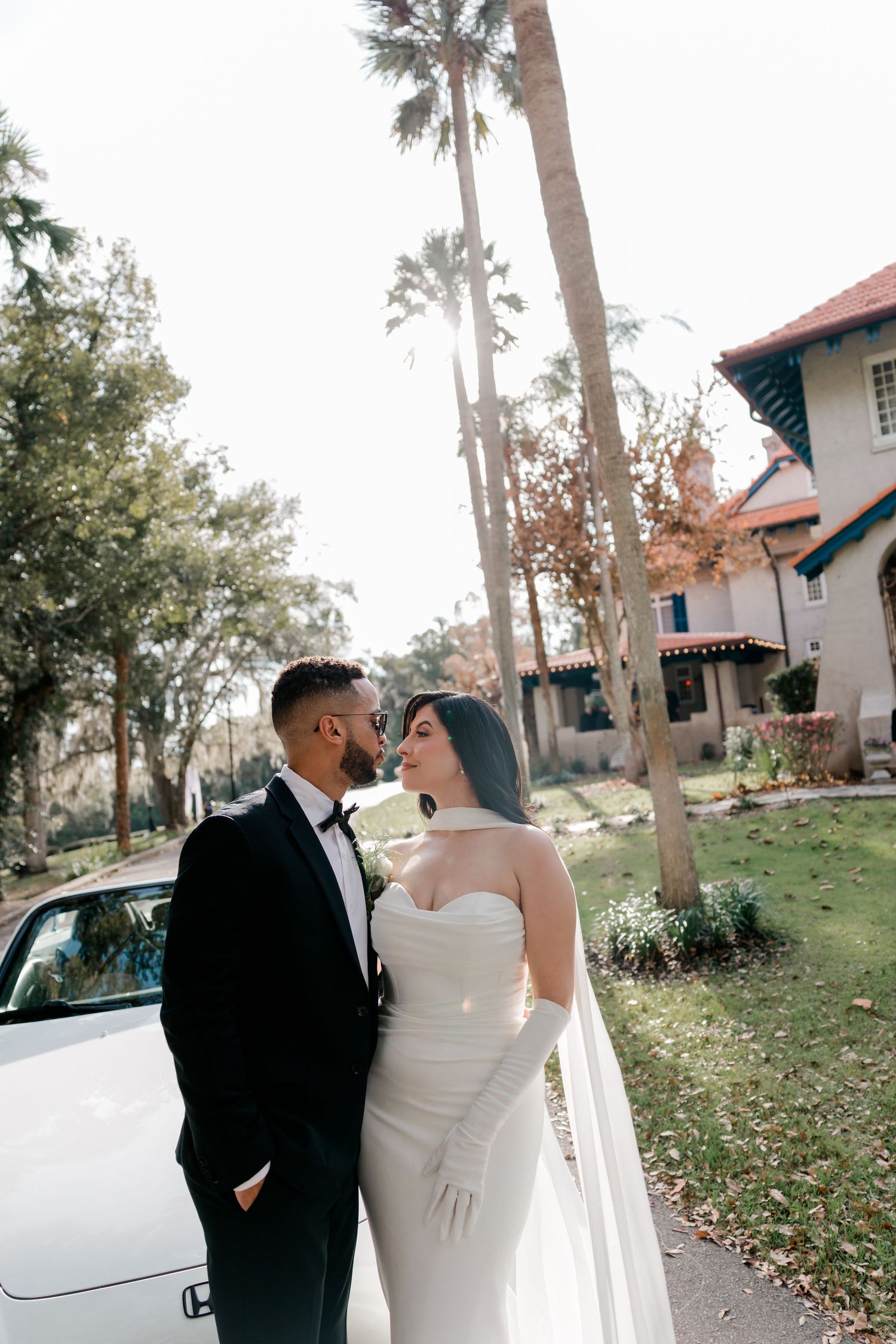 A romantic outdoor wedding photoshoot sequence showing a couple embracing under moody autumn skies.