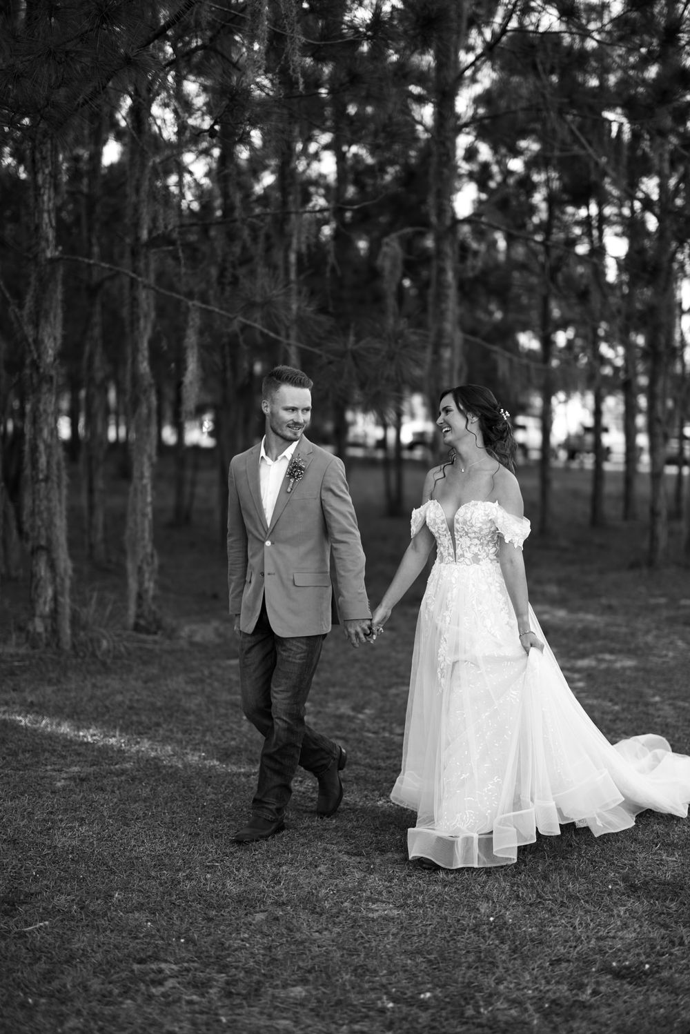 A romantic wedding photoshoot in a wooded pine forest setting.