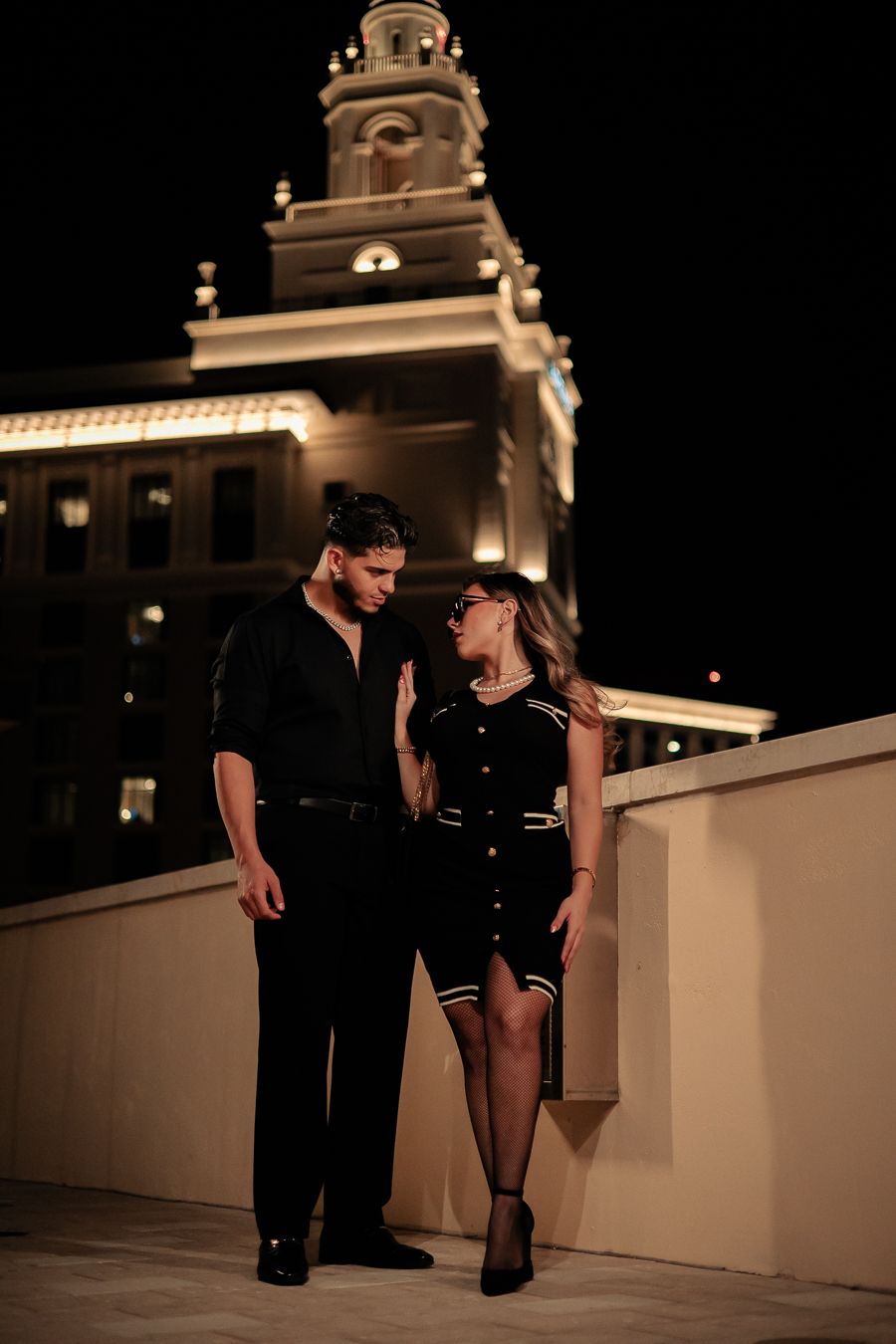 Editorial South Florida rooftop engagement portrait, cinematic night lighting perfect for Pinterest weddings by MannyPortraits.