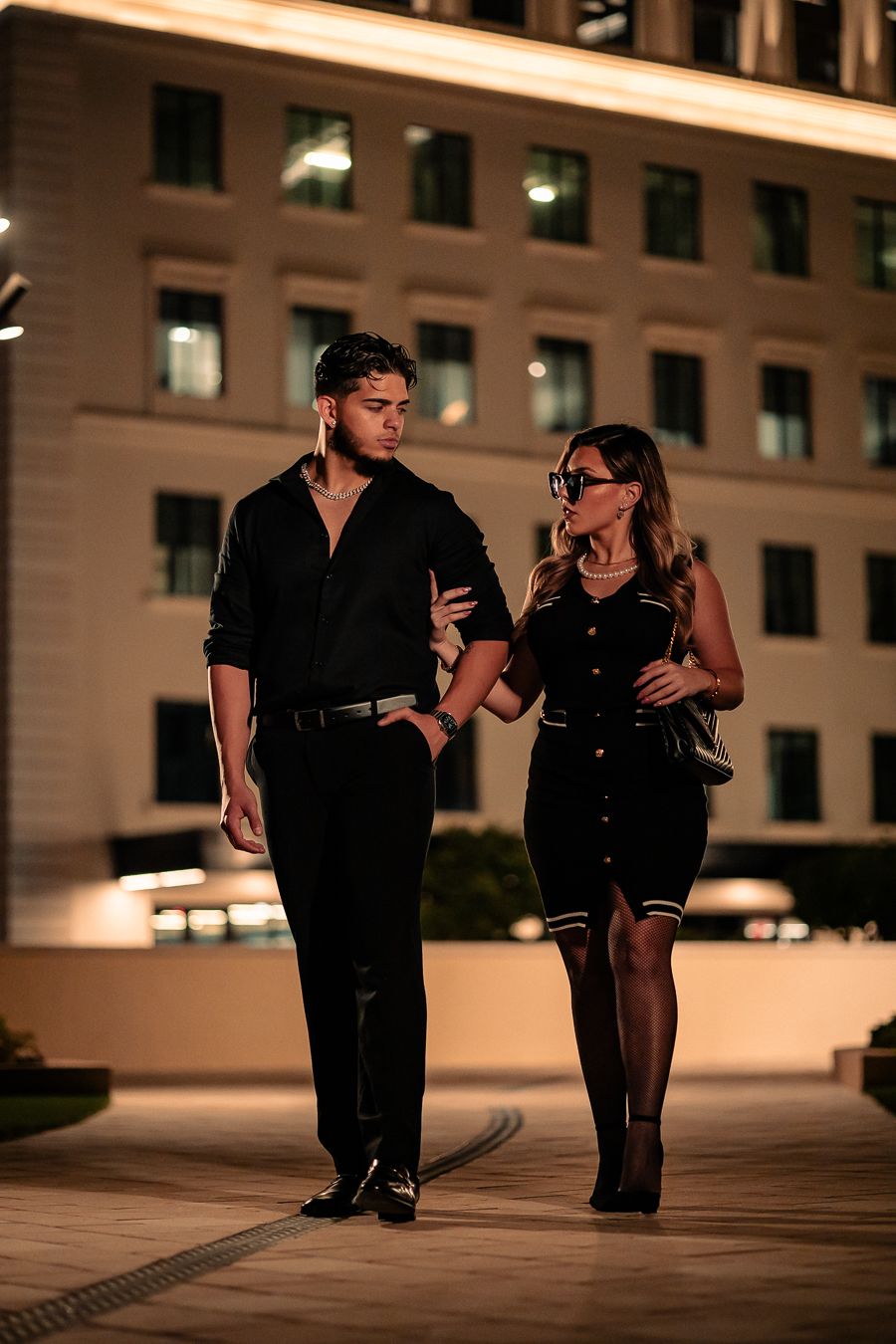 Romantic South Florida engagement session under city lights, Pinterest-ready couples photography by MannyPortraits.