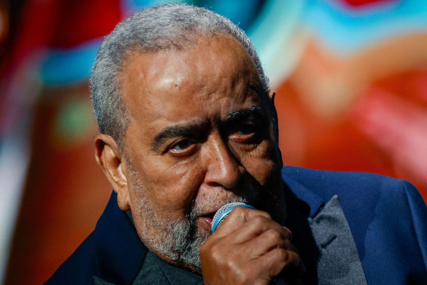 Andy Montañez performing on stage during his "My First Goodbye" concert, celebrating 60 years in tropical music.