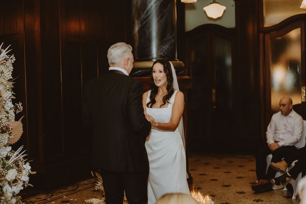 A collage of wedding photos showing dancing, embracing moments, and venue decor in warm lighting.