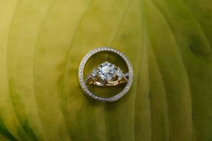 Sparkling diamond engagement ring photographed in a series of macro shots against a soft green bokeh background.