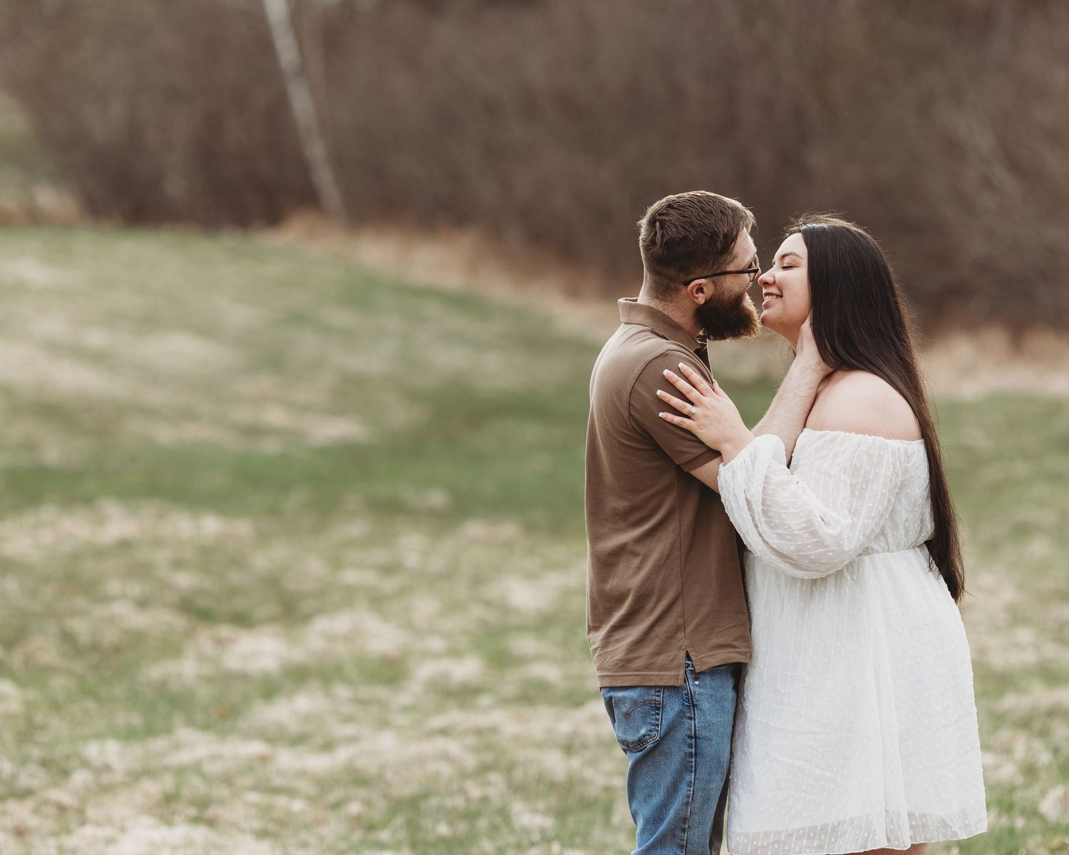 Professional photo of a couple smiling at each other