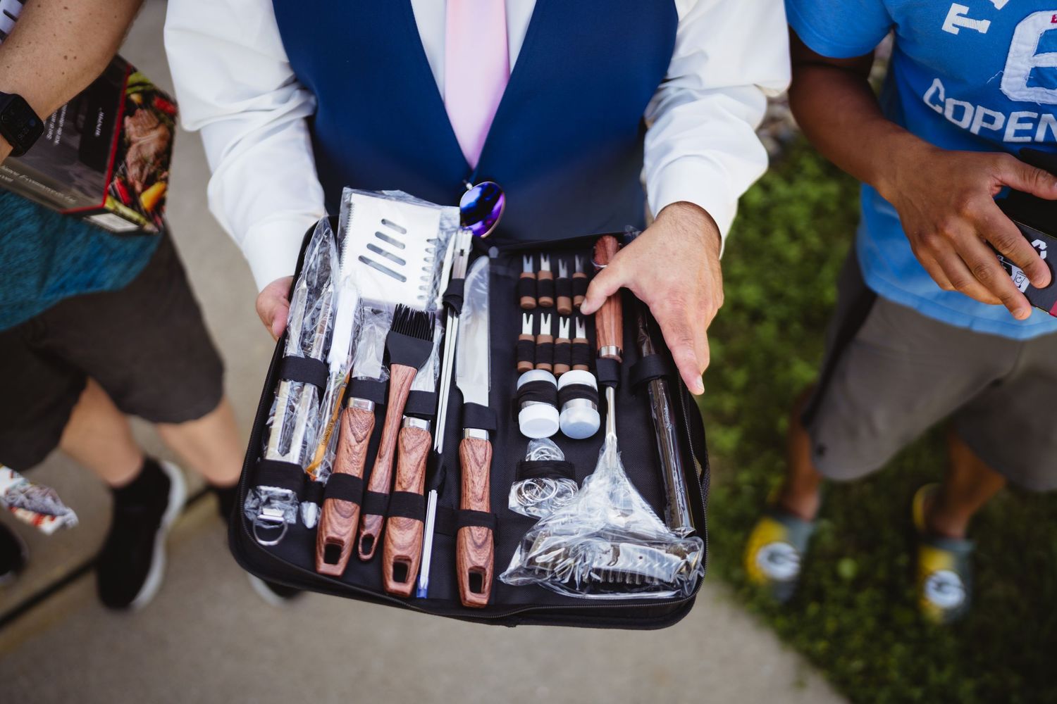 Overhead view of an open makeup case showing organized cosmetic products and applicators.