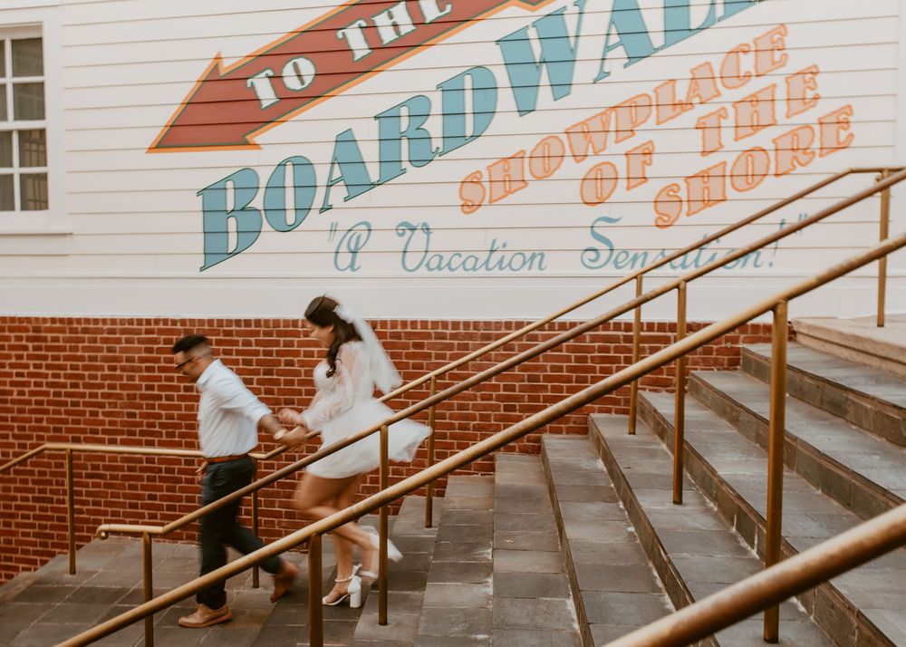 Bride & Groom eloping at Disney Boardwalk. Cred: LexTakePix