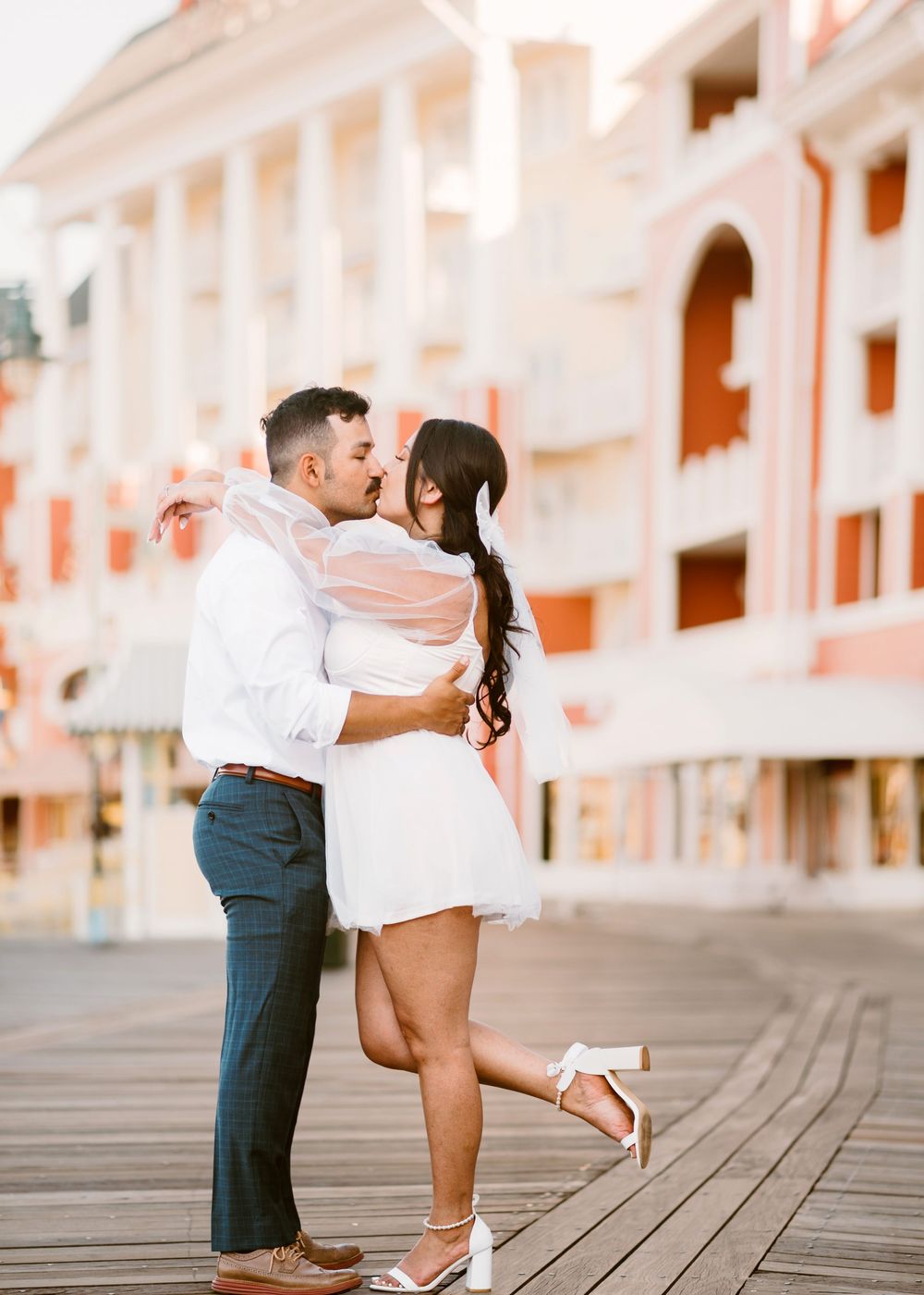 Bride & Groom eloping at Disney Boardwalk. Cred: LexTakePix