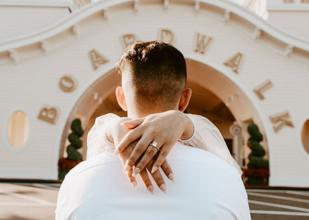 Bride & Groom eloping at Disney Boardwalk. Cred: LexTakePix