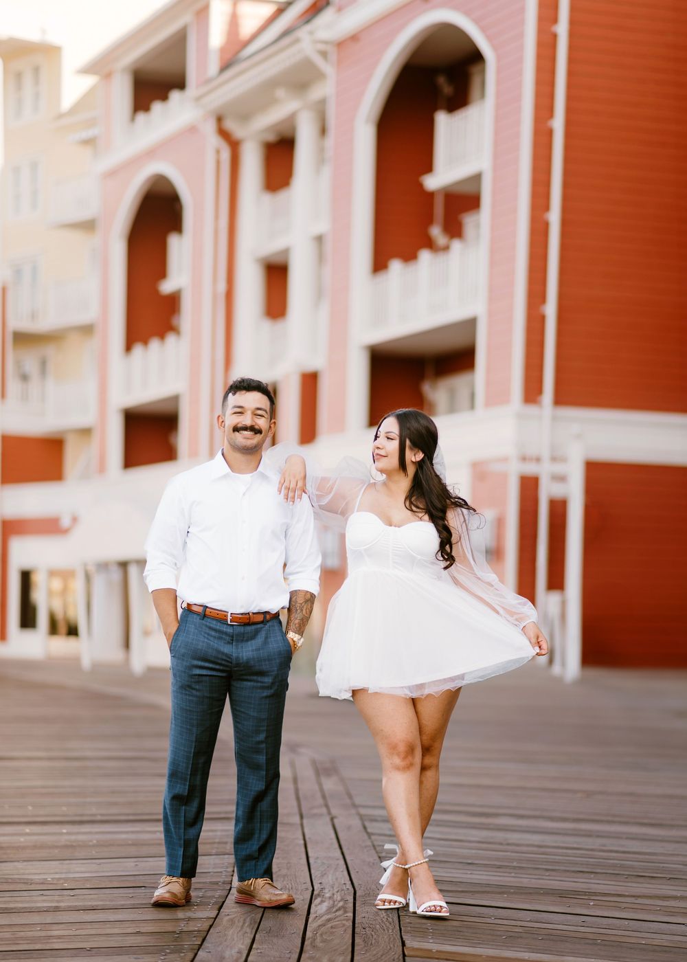 Bride & Groom eloping at Disney Boardwalk. Cred: LexTakePix