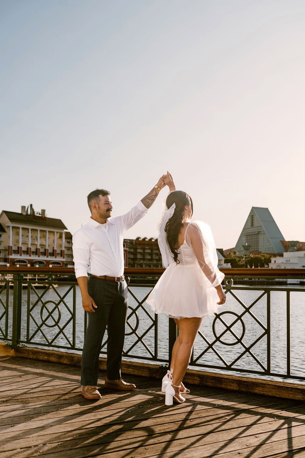 Bride & Groom eloping at Disney Boardwalk. Cred: LexTakePix