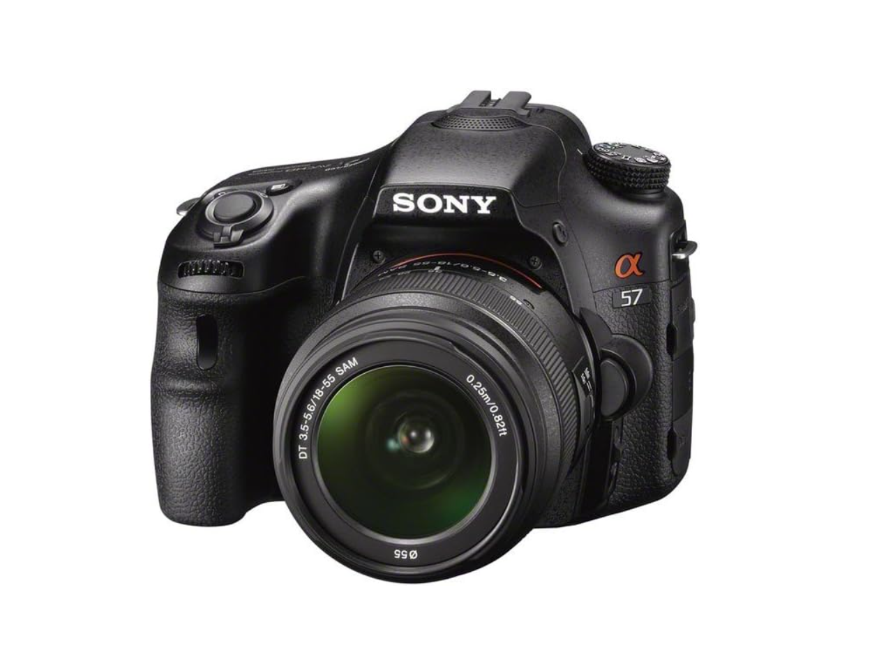 Sony Alpha SLT-A57 DSLR camera with kit lens on white background.