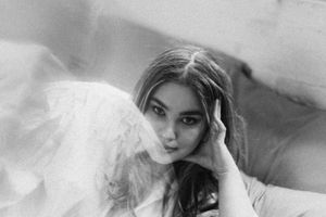 Dreamy black and white portrait with soft ethereal lighting.