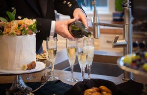 Close-up shots of wine glasses, plates and dining table settings at an upscale restaurant.