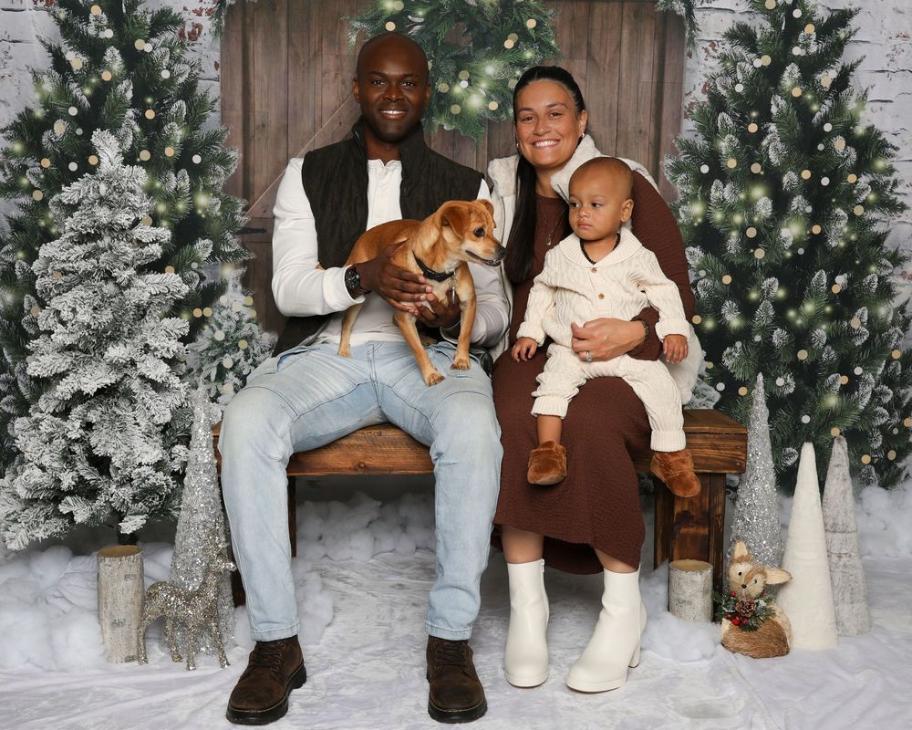 Family holiday portraits in front of decorated Christmas trees and snowy scene.
