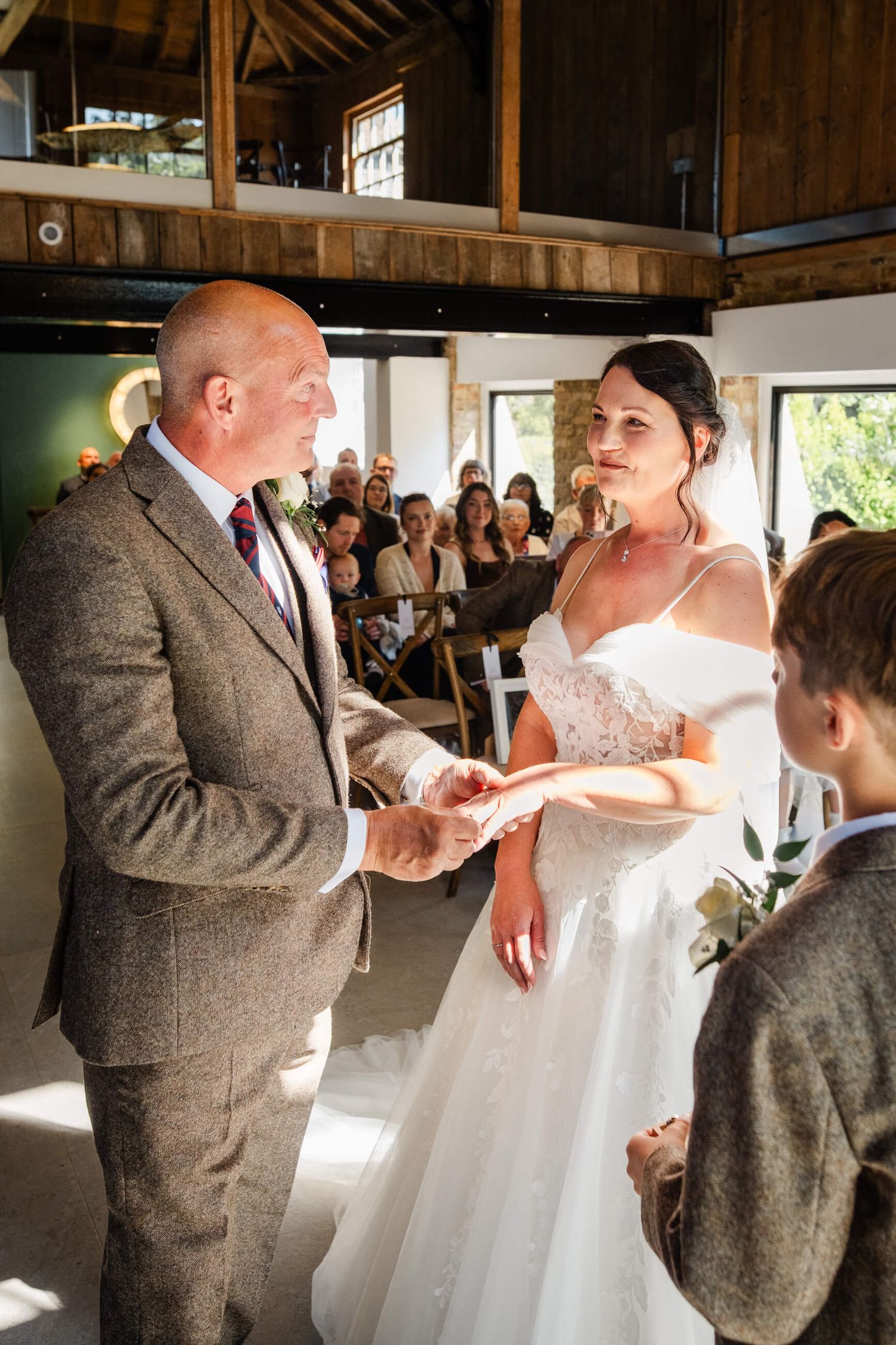 Ring exchange at wedding chapel house in Kent