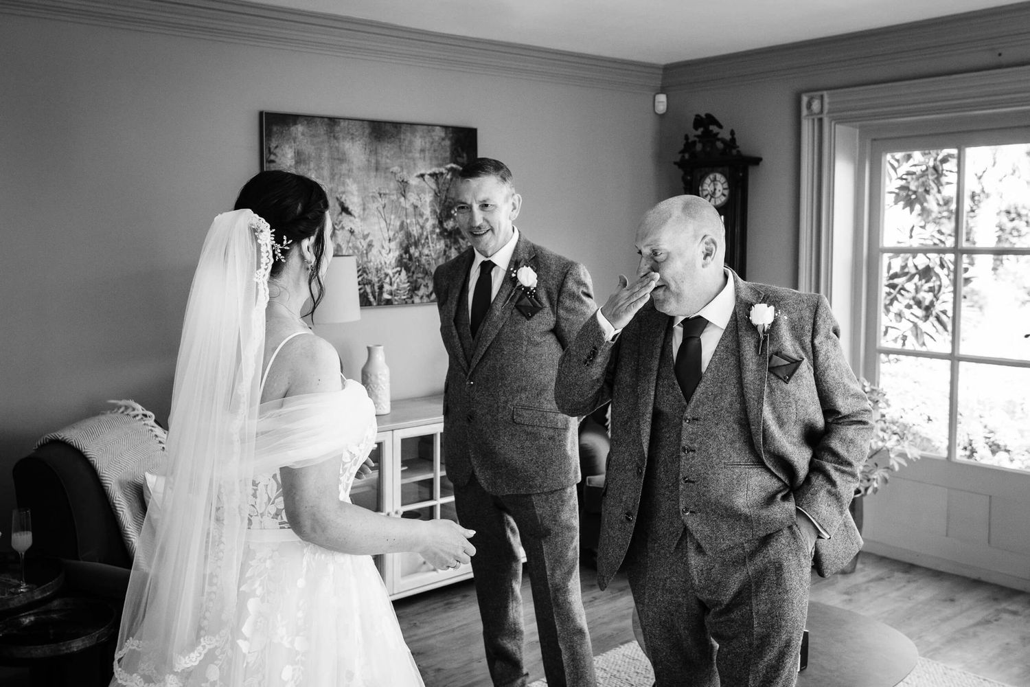 bride meets her brothers, candid moment at chapel house estate