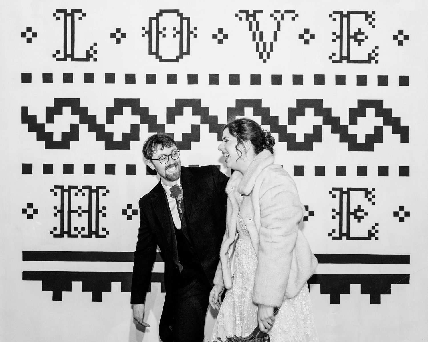 A collection of black and white vintage wedding photos arranged in a horizontal row showing couples in formal attire.
