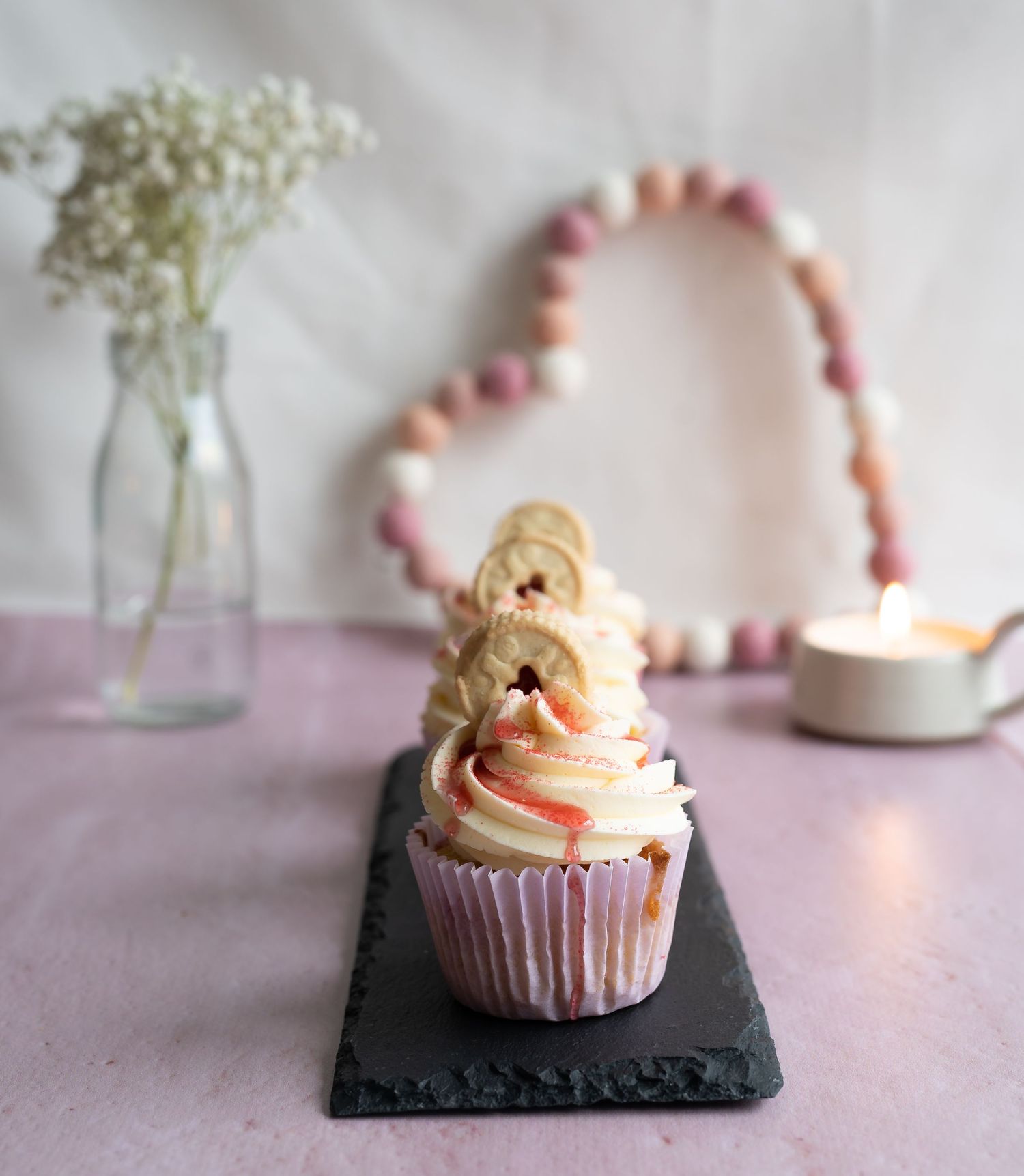 bakery image of muffin cakes styled on a valentines theme with props food photography