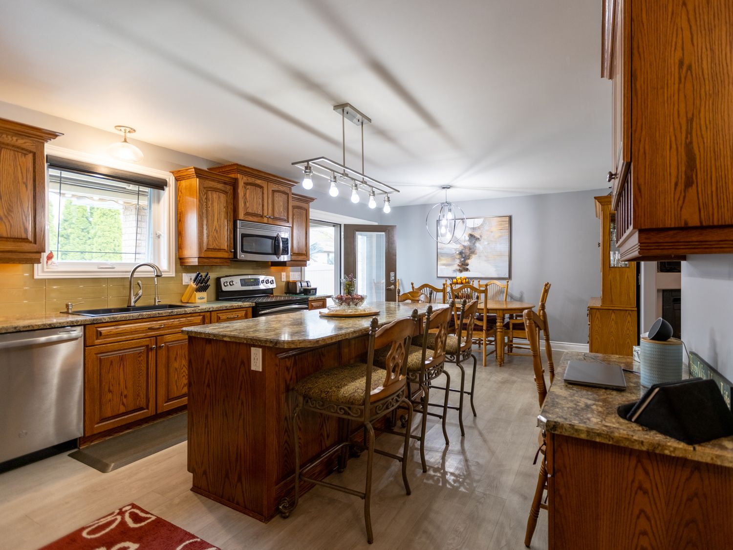 Bright open-concept kitchen photographed in Essex County home listing