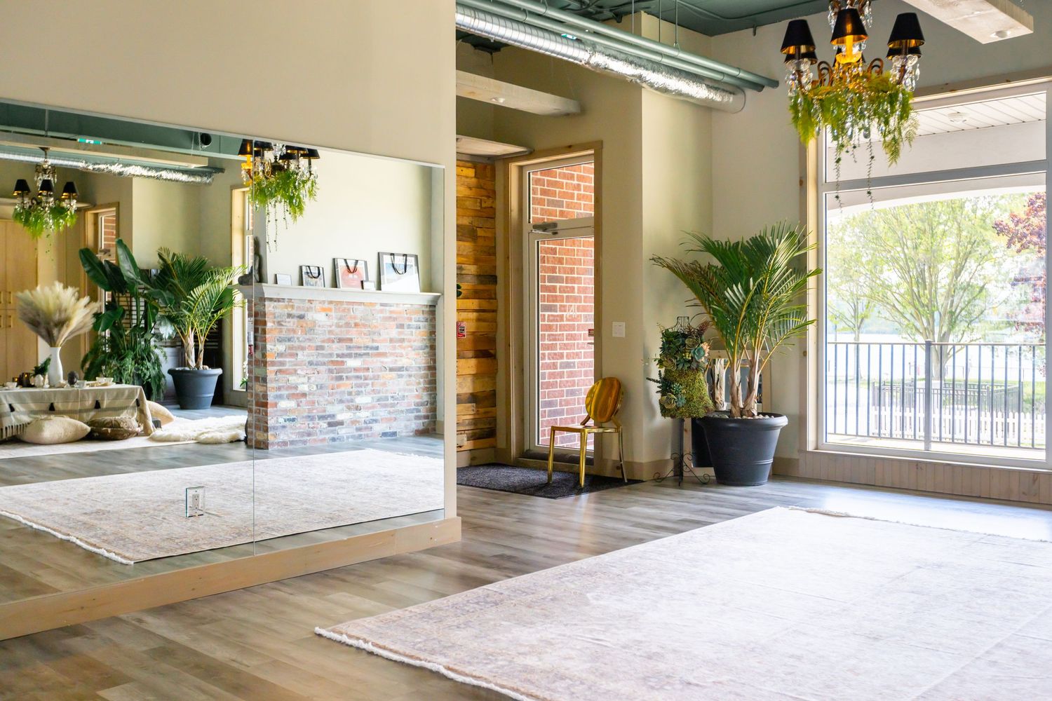 Open concept yoga studio with natural lighting and minimalist décor.
