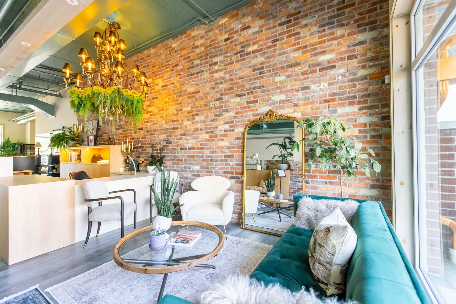 Bright and modern yoga studio interior with natural light and hardwood flooring.