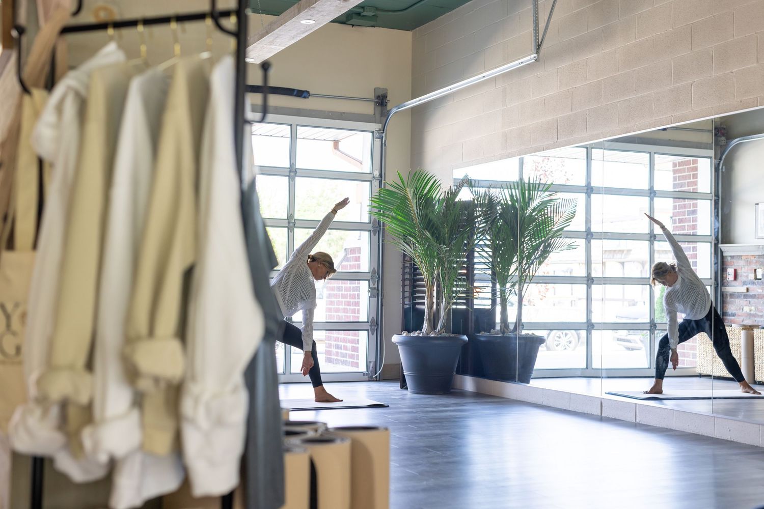 Modern wellness center featuring a bright and inviting yoga practice area.