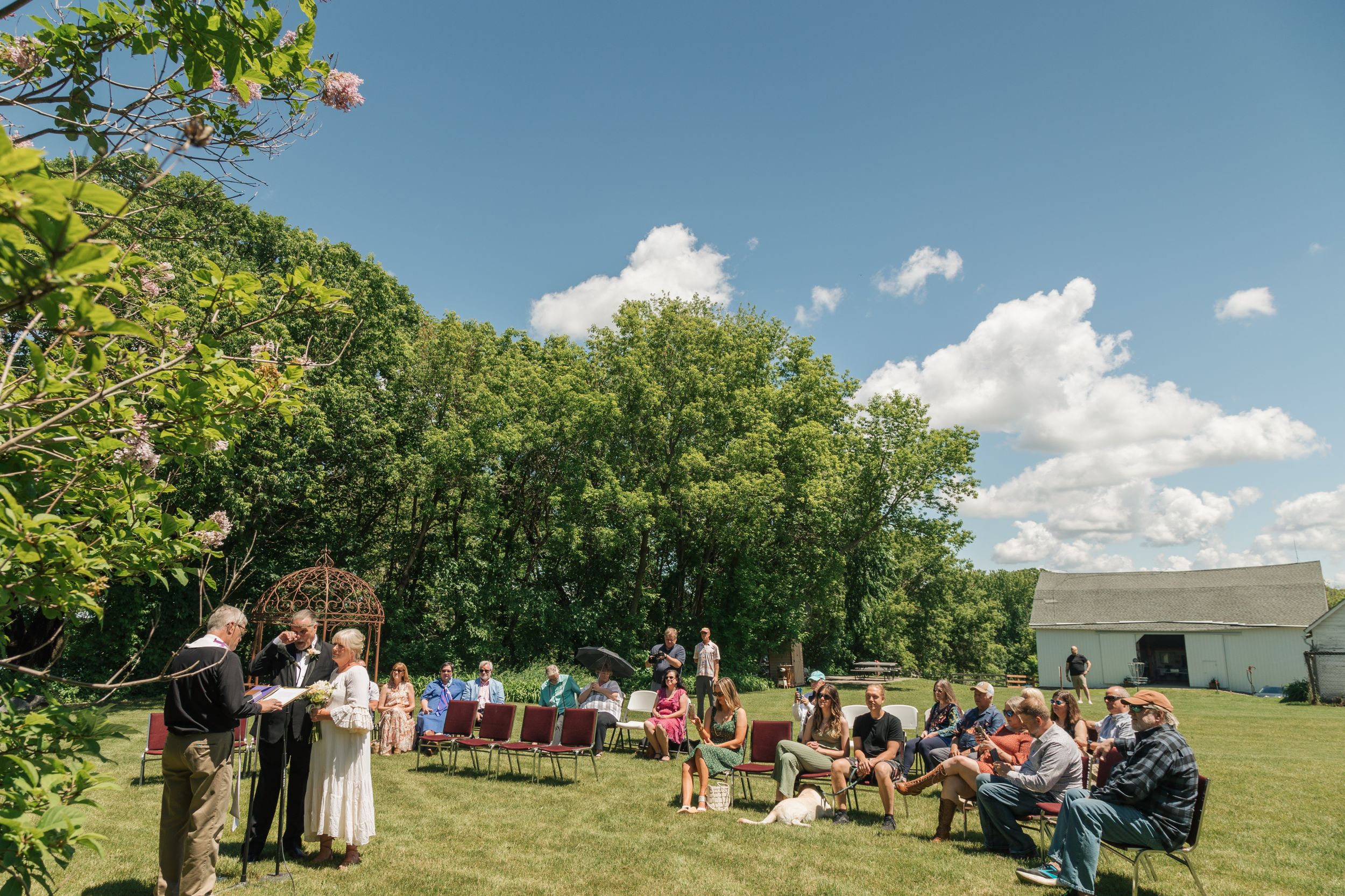 An outdoor, farm wedding ceremony