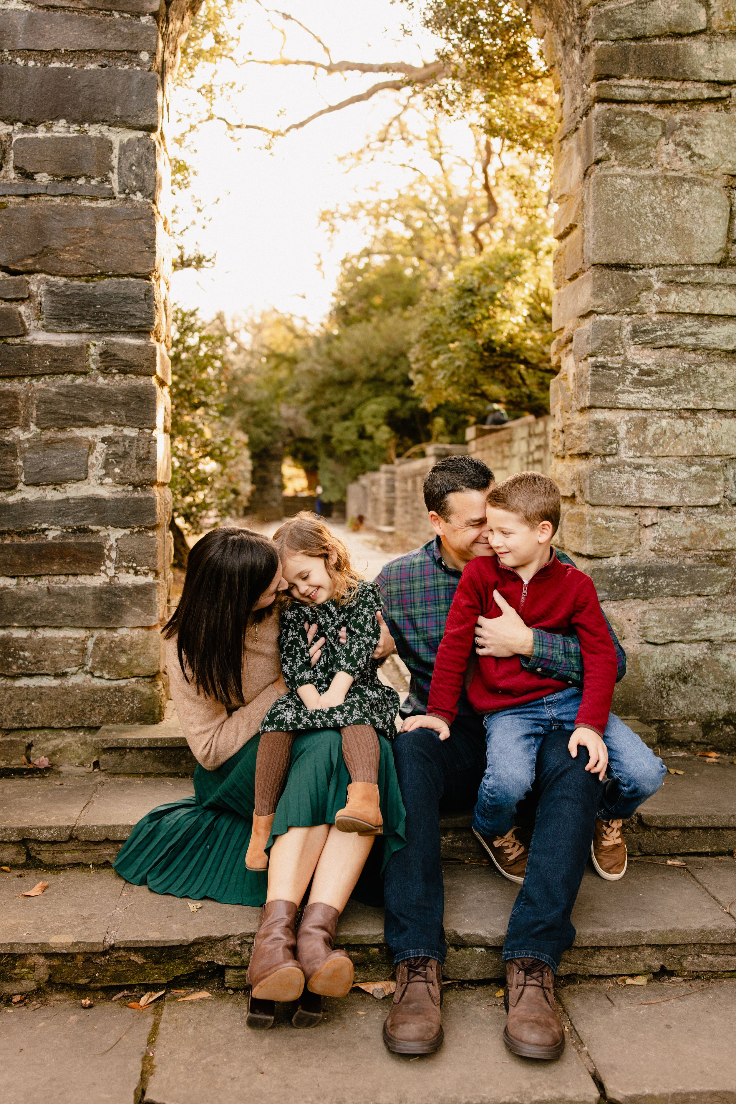 A series of romantic fall photos showing a couple sitting on stone steps in warm autumn light in Rockville Maryland