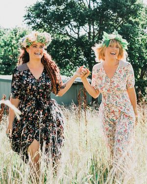 A sequence of joyful moments captured in a wildflower meadow with people wearing floral dresses and flower crowns.