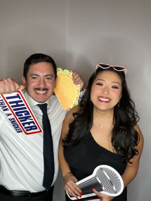 A series of photo booth style snapshots showing two people posing playfully with boxing gloves and NFL gear.
